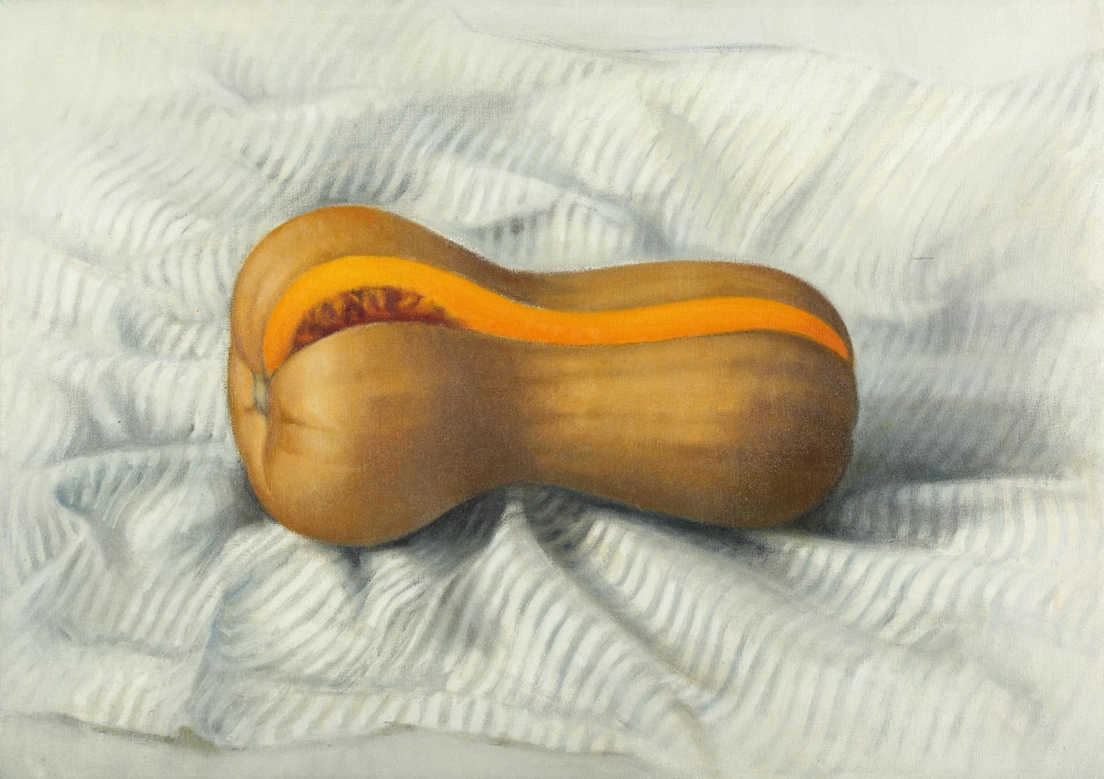 Calabaza con tajo sobre pa&ntilde;o rayado
